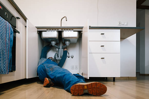 Professional Emergency Plumber technician working in Piqua, OH